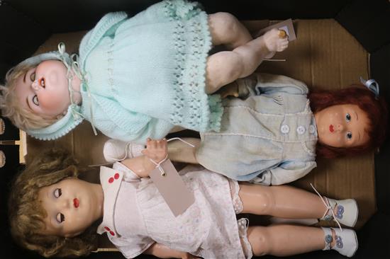 An Armand Marseille 990 character baby doll, bisque head and jointed composition body and two girl dolls,